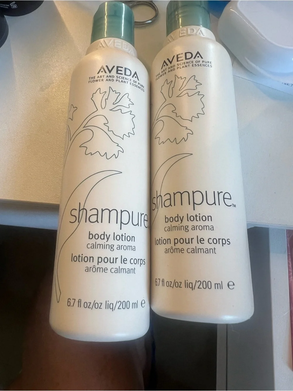 AVEDA White Bottle with Teal Cap Body Lotion